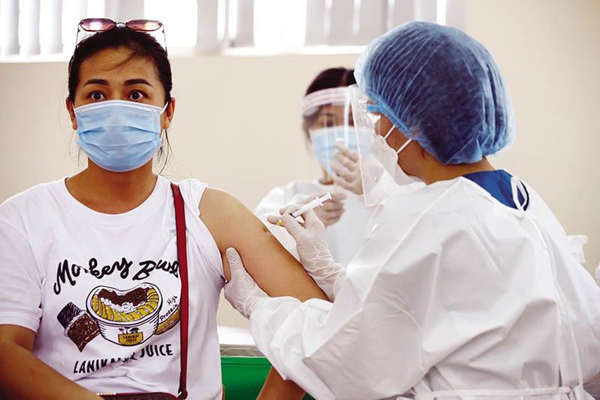 phuc hoi kinh te vaccine