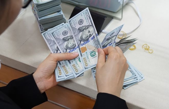 ty gia ngoai te ngay 195 nha dau tu ban thao dong usd tiep tuc lao doc