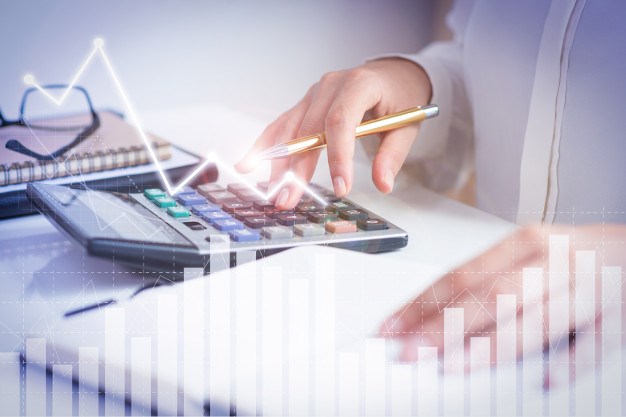accountant calculating profit with financial analysis graphs 74855 4937